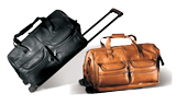 black and tan leather framed rolling cabin bag